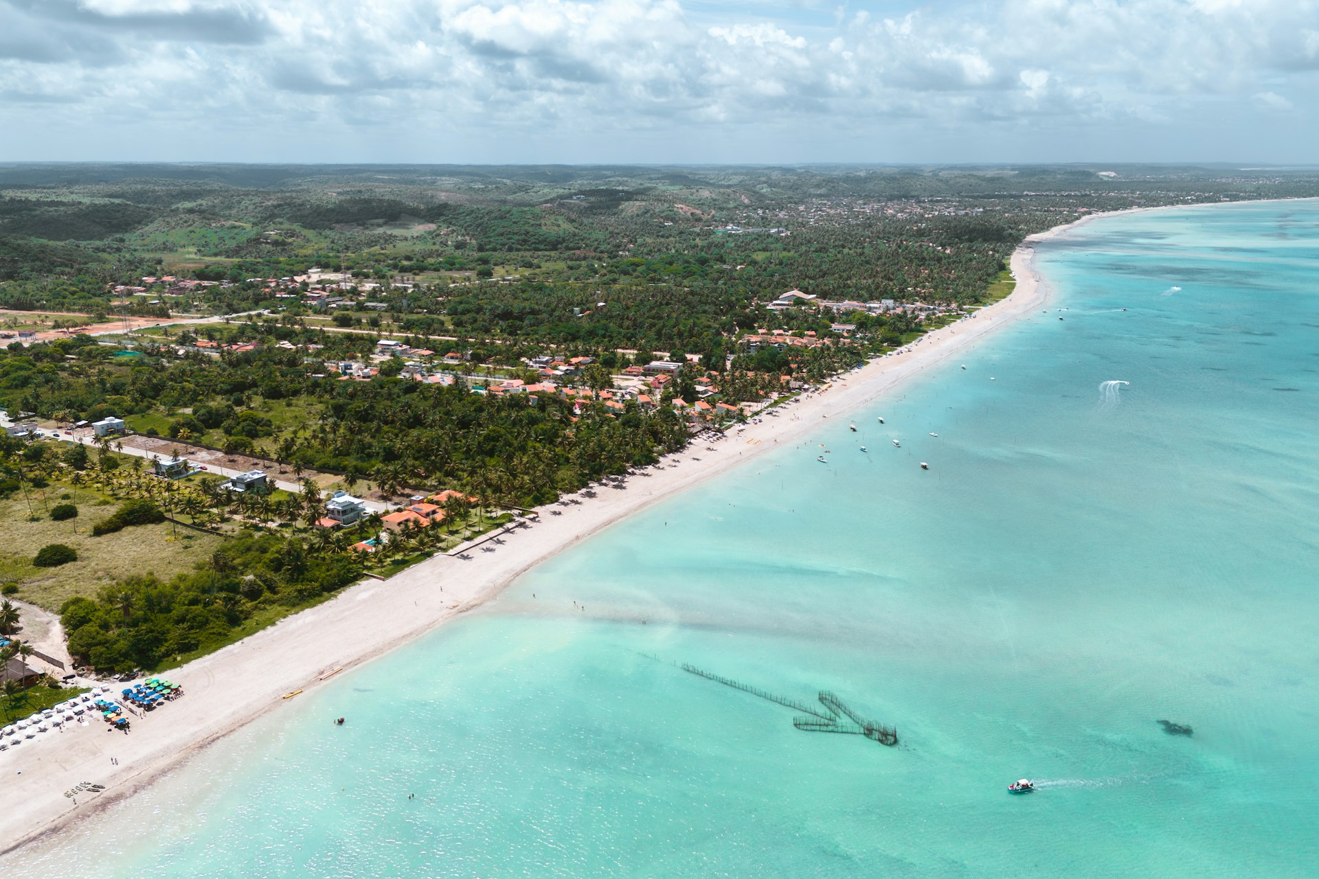 a bird's eye view of a beach and ocean